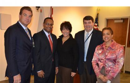 Photo of Congressional representitives with OUC staff